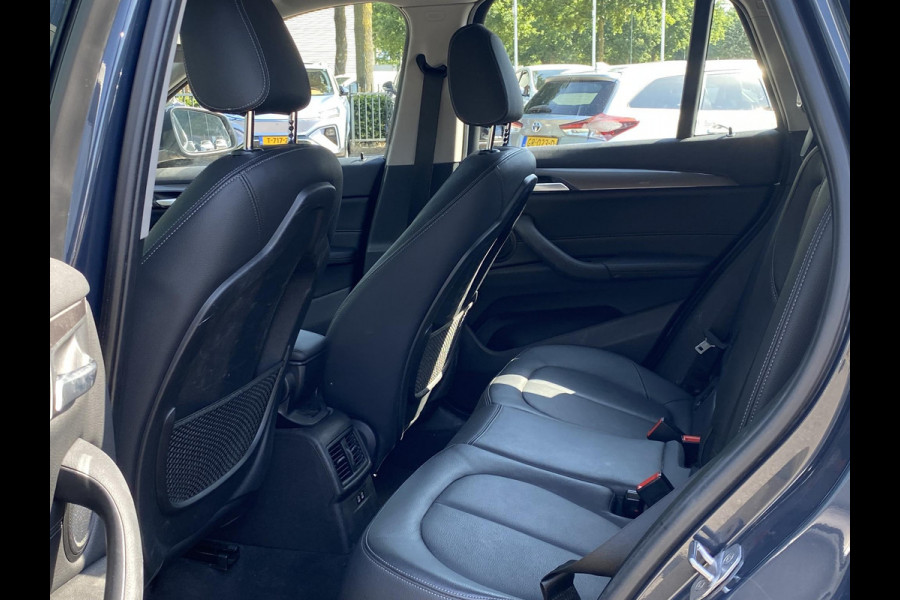 BMW X1 sDrive20i TREKHAAK | ELEK. KOFFER | LEDER | RIJKLAAR INCL. 12 MND. BOVAGGARANTIE