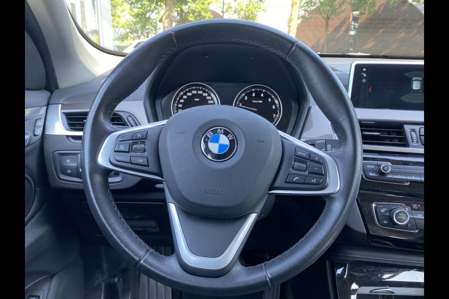 BMW X1 sDrive20i TREKHAAK | ELEK. KOFFER | LEDER | RIJKLAAR INCL. 12 MND. BOVAGGARANTIE