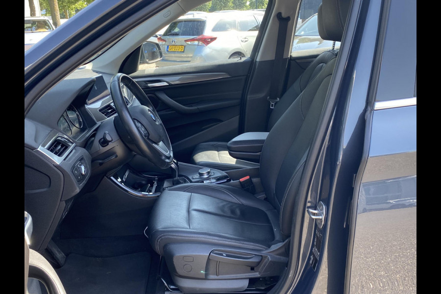 BMW X1 sDrive20i TREKHAAK | ELEK. KOFFER | LEDER | RIJKLAAR INCL. 12 MND. BOVAGGARANTIE
