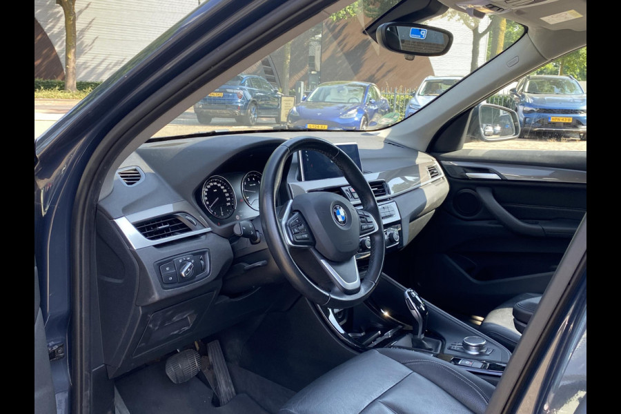 BMW X1 sDrive20i TREKHAAK | ELEK. KOFFER | LEDER | RIJKLAAR INCL. 12 MND. BOVAGGARANTIE