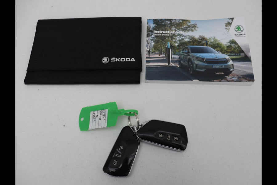Škoda ENYAQ iV 80 | Stoel & stuurverwarming | Carplay | Keyless | Navigatie | Camera | Half leder | Cruise control | Full LED | Parkeerhulp