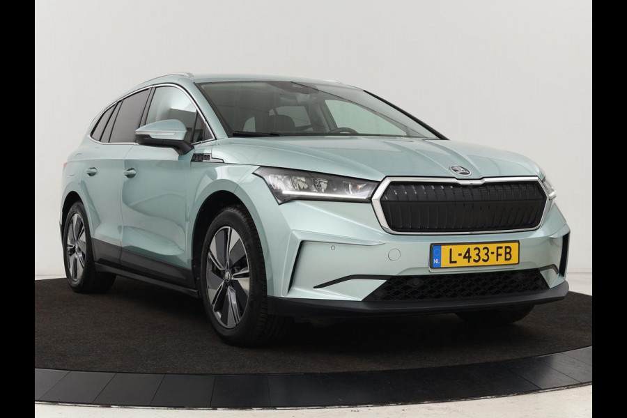 Škoda ENYAQ iV 80 | Stoel & stuurverwarming | Carplay | Keyless | Navigatie | Camera | Half leder | Cruise control | Full LED | Parkeerhulp