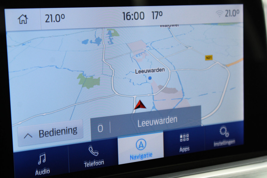 Ford Focus 1.0-125pk EcoBoost Titanium. Erg nette, luxe en goed onderhouden Ford Focus. Volautm. airco dual, stoel-, stuur- en voorraamverw., trekhaak, Xenon verl., LM wielen, navigatie, telefoonvoorb., adaptieve cruise cntrl,  keyless entry/keyless go etc, etc.