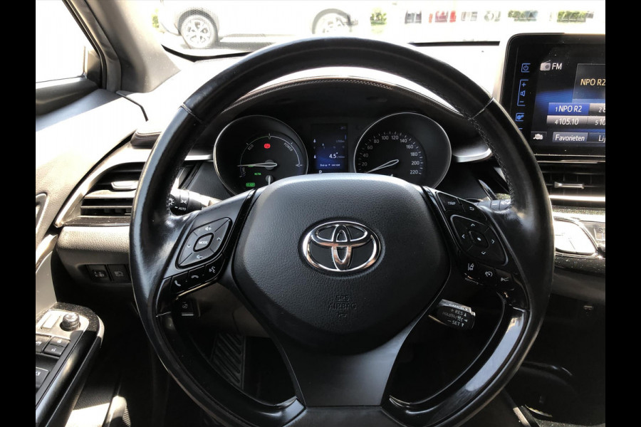 Toyota C-HR 1.8 Hybrid Executive | Trekhaak, Dodehoekherkenning, Navigatie, Parkeersensoren, Stoel + Stuurverwarming