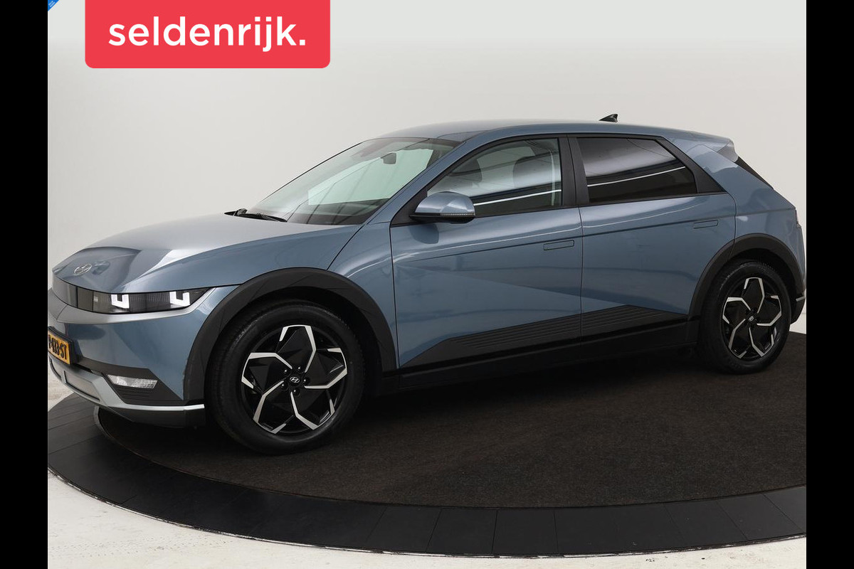 Hyundai IONIQ 5 Style 73kWh | SOH 100% | Adaptive cruise | Camera | Carplay | Keyless | Navigatie | Full LED | 19'' lichtmetalen velgen Hyundai IONIQ 5 Style 73kWh | SOH 100% | Adaptive cruise | Camera | Carplay | Keyless | Navigatie | Full LED | 19'' lichtmetalen velgen