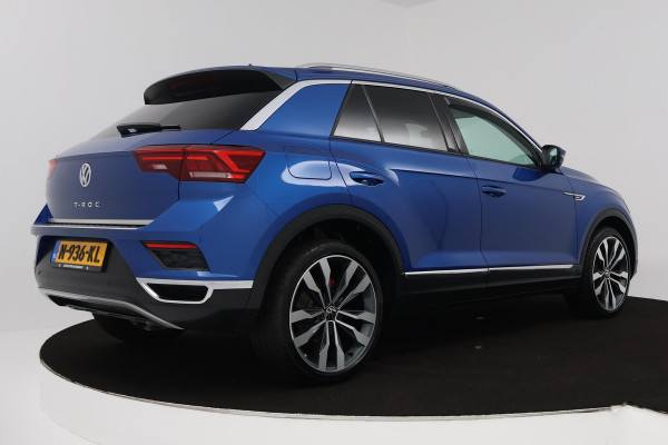 Volkswagen T-Roc 1.5 TSI Sport Business R (PARKEERSENSOREN, ACHTERUITRIJCAMERA, STOELVERWARMING, NAVIGATIE)