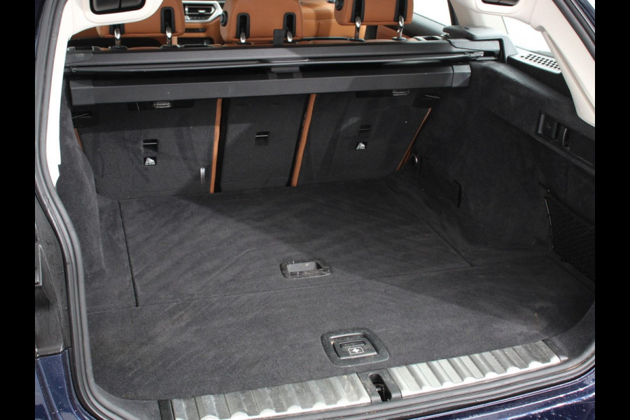 BMW 3 Serie Touring 318i High Executive Edition Leder Navigatie Apple Carplay/Android Auto Camera Parkeersensoren Virtual Cockpit Stoelverwarming Cruise Control Ledverlichting Getinte ramen Climate Control