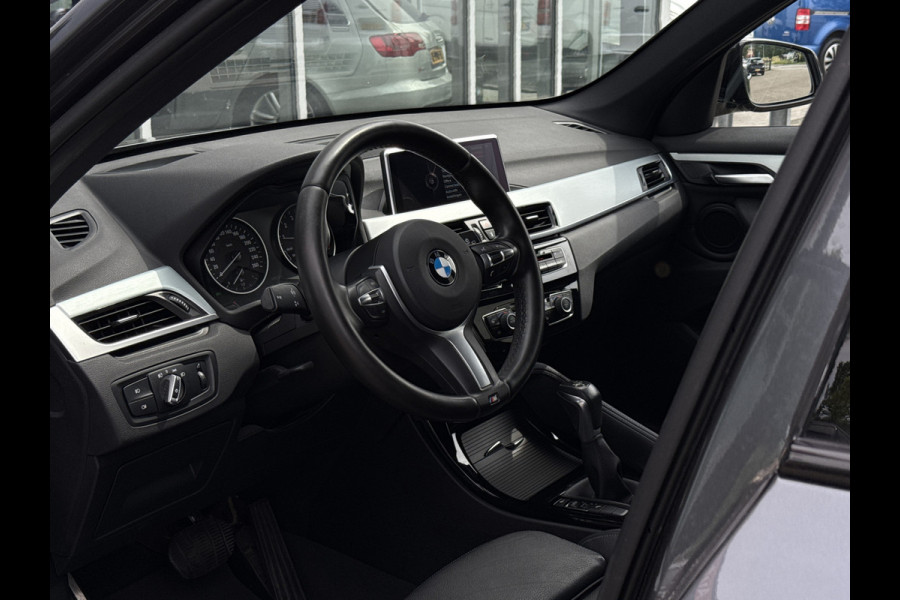 BMW X1 sDrive20i High Executive M-Sport | 1e Eig | Dealer OH | Head-up | Trekhaak | Leder