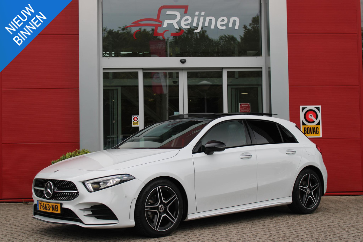 Mercedes-Benz A-Klasse 180 136PK AUTOMAAT AMG LINE | STERRENHEMEL! | PANORAMISCH SCHUIF/KANTEL DAK | SFEER VERLICHTING | NAVIGATIE | ACHTERUITRIJ CAMERA | PARKEERSENSOREN VOOR EN ACHTER | HIGH PERFORMANCE LED KOPLAMPEN | STOEL VERWARMING | KEYLESS - GO | SPIEGEL PAKKET | NIGHT PAKKET | LICHTMETALEN VELGEN 18" | EERSTE EIGENAAR! | Mercedes-Benz A-Klasse 180 136PK AUTOMAAT AMG LINE | STERRENHEMEL! | PANORAMISCH SCHUIF/KANTEL DAK | SFEER VERLICHTING | NAVIGATIE | ACHTERUITRIJ CAMERA | PARKEERSENSOREN VOOR EN ACHTER | HIGH PERFORMANCE LED KOPLAMPEN | STOEL VERWARMING | KEYLESS - GO | SPIEGEL PAKKET | NIGHT PAKKET | LICHTMETALEN VELGEN 18" | EERSTE EIGENAAR! |