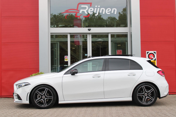 Mercedes-Benz A-Klasse 180 136PK AUTOMAAT AMG LINE | STERRENHEMEL! | PANORAMISCH SCHUIF/KANTEL DAK | SFEER VERLICHTING | NAVIGATIE | ACHTERUITRIJ CAMERA | PARKEERSENSOREN VOOR EN ACHTER | HIGH PERFORMANCE LED KOPLAMPEN | STOEL VERWARMING | KEYLESS - GO | SPIEGEL PAKKET | NIGHT PAKKET | LICHTMETALEN VELGEN 18" | EERSTE EIGENAAR! |