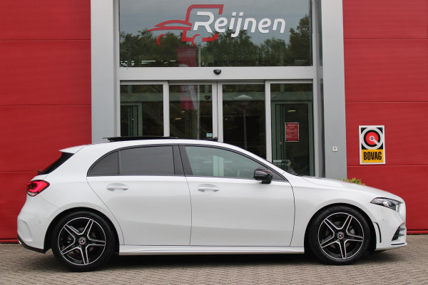 Mercedes-Benz A-Klasse 180 136PK AUTOMAAT AMG LINE | STERRENHEMEL! | PANORAMISCH SCHUIF/KANTEL DAK | SFEER VERLICHTING | NAVIGATIE | ACHTERUITRIJ CAMERA | PARKEERSENSOREN VOOR EN ACHTER | HIGH PERFORMANCE LED KOPLAMPEN | STOEL VERWARMING | KEYLESS - GO | SPIEGEL PAKKET | NIGHT PAKKET | LICHTMETALEN VELGEN 18" | EERSTE EIGENAAR! |