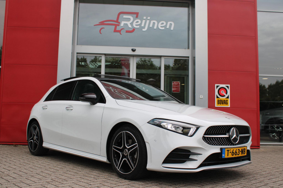 Mercedes-Benz A-Klasse 180 136PK AUTOMAAT AMG LINE | STERRENHEMEL! | PANORAMISCH SCHUIF/KANTEL DAK | SFEER VERLICHTING | NAVIGATIE | ACHTERUITRIJ CAMERA | PARKEERSENSOREN VOOR EN ACHTER | HIGH PERFORMANCE LED KOPLAMPEN | STOEL VERWARMING | KEYLESS - GO | SPIEGEL PAKKET | NIGHT PAKKET | LICHTMETALEN VELGEN 18" | EERSTE EIGENAAR! |