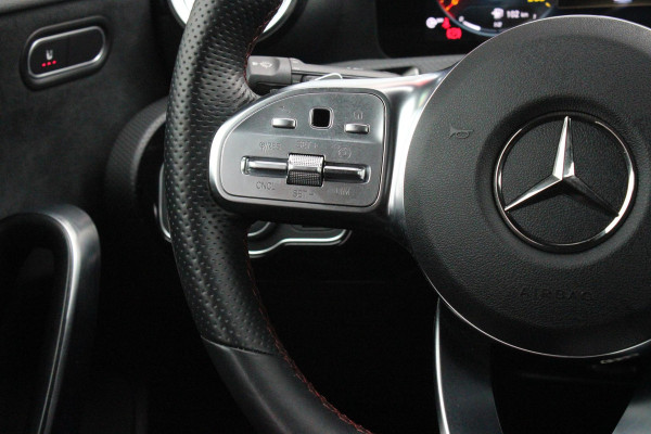 Mercedes-Benz A-Klasse 180 136PK AUTOMAAT AMG LINE | STERRENHEMEL! | PANORAMISCH SCHUIF/KANTEL DAK | SFEER VERLICHTING | NAVIGATIE | ACHTERUITRIJ CAMERA | PARKEERSENSOREN VOOR EN ACHTER | HIGH PERFORMANCE LED KOPLAMPEN | STOEL VERWARMING | KEYLESS - GO | SPIEGEL PAKKET | NIGHT PAKKET | LICHTMETALEN VELGEN 18" | EERSTE EIGENAAR! |