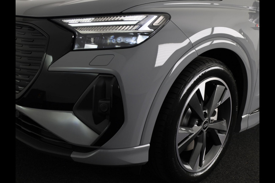 Audi Q4 Sportback e-tron 45 quattro S Edition 82 kWh panoramadak, achteruitrij camera, adaptive cruise control, optiek pakket zwart plus, privacy glass, lichtpakket, spiegelkappen zwart