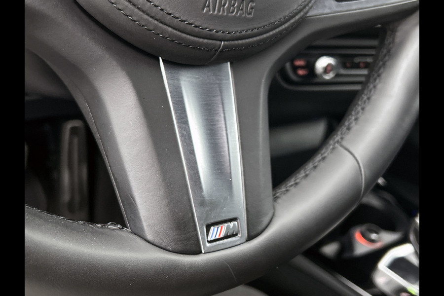 BMW 1-serie 118i High Executive M-Sport Plus (Dealer onderhoud, Navi Pro, Camera, PDC V+A, StoelV, Digitale dash, Etc)