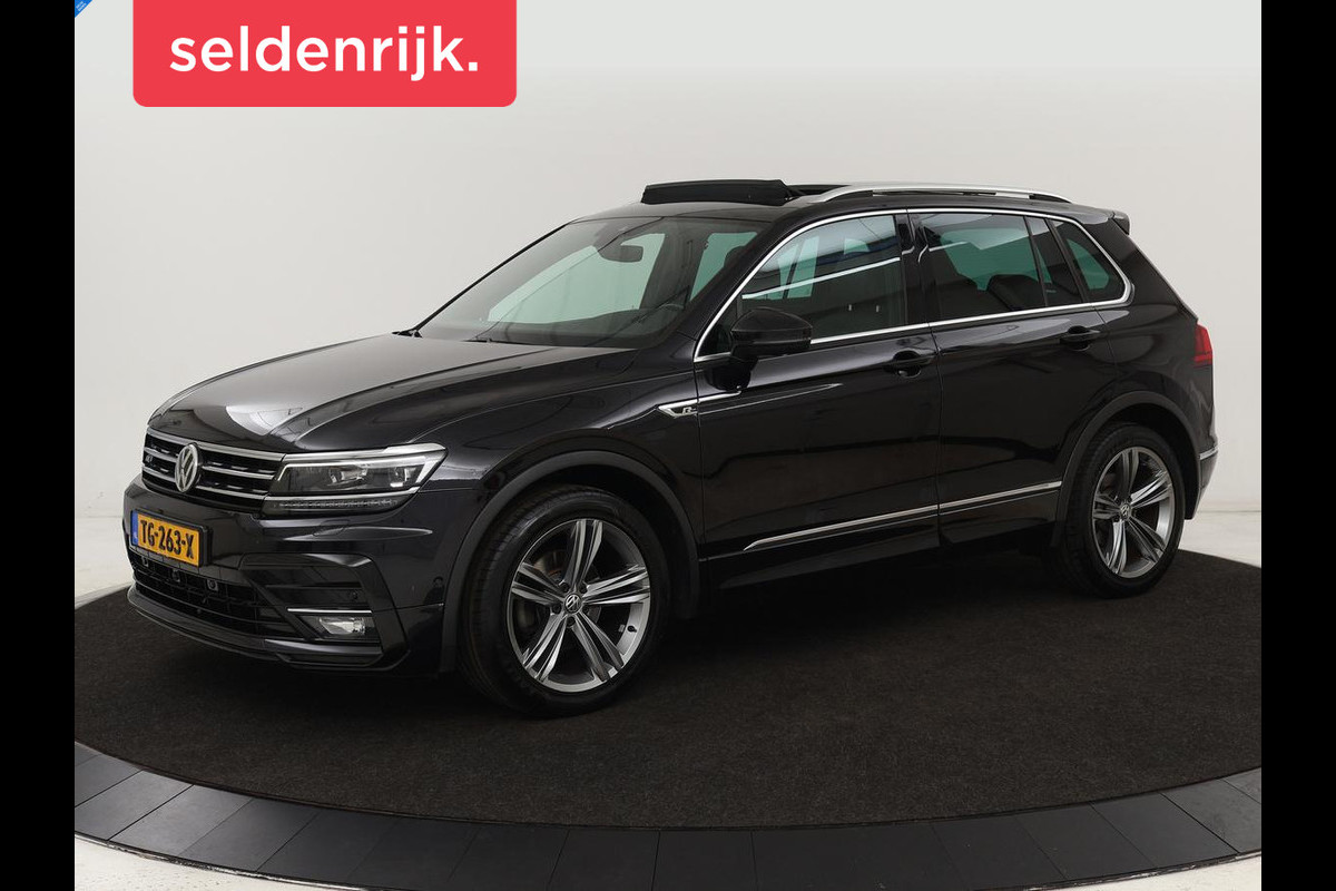 Volkswagen Tiguan 1.4 TSI R Line | Panoramadak | Leder | Stoelverwarming | Trekhaak | Carplay | 360 camera | Virtual Cockpit | Navigatie | Adaptive cruise | 19'' lichtmetalen velgen Volkswagen Tiguan 1.4 TSI R Line | Panoramadak | Leder | Stoelverwarming | Trekhaak | Carplay | 360 camera | Virtual Cockpit | Navigatie | Adaptive cruise | 19'' lichtmetalen velgen