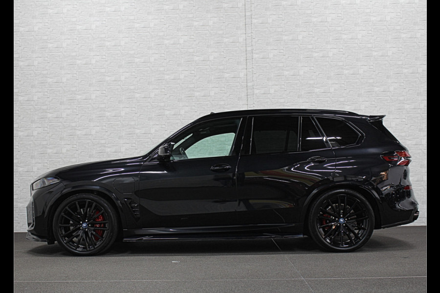 BMW X5 50e M-Sport Pro Performance | 360 View | Massage & Ventilatie | ACC | Individual Leder | Pano | Head-Up | 4-Zone Clima | 22'' | Stoelverwarming V+A | Laser-LED | 2x Memory | Keyless-Entry | Trekhaak | Comfortstoelen | Beker Koeling+Verwarming | Stuurverwarming | Zonwering | Carplay | Draadloos Laden |