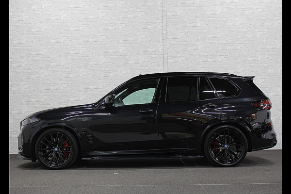 BMW X5 50e M-Sport Pro Performance | 360 View | Massage & Ventilatie | ACC | Individual Leder | Pano | Head-Up | 4-Zone Clima | 22'' | Stoelverwarming V+A | Laser-LED | 2x Memory | Keyless-Entry | Trekhaak | Comfortstoelen | Beker Koeling+Verwarming | Stuurverwarming | Zonwering | Carplay | Draadloos Laden |