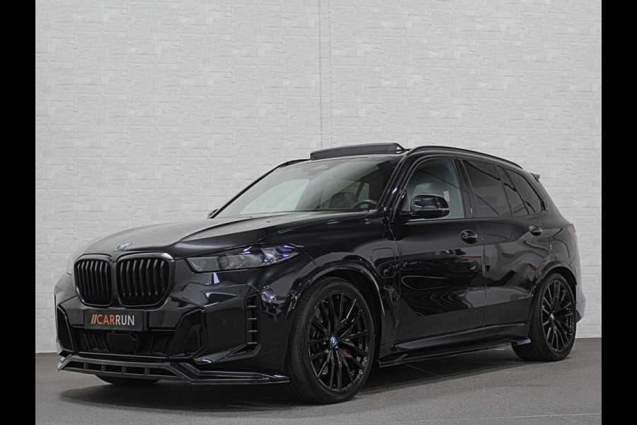 BMW X5 50e M-Sport Pro Performance | 360 View | Massage & Ventilatie | ACC | Individual Leder | Pano | Head-Up | 4-Zone Clima | 22'' | Stoelverwarming V+A | Laser-LED | 2x Memory | Keyless-Entry | Trekhaak | Comfortstoelen | Beker Koeling+Verwarming | Stuurverwarming | Zonwering | Carplay | Draadloos Laden |