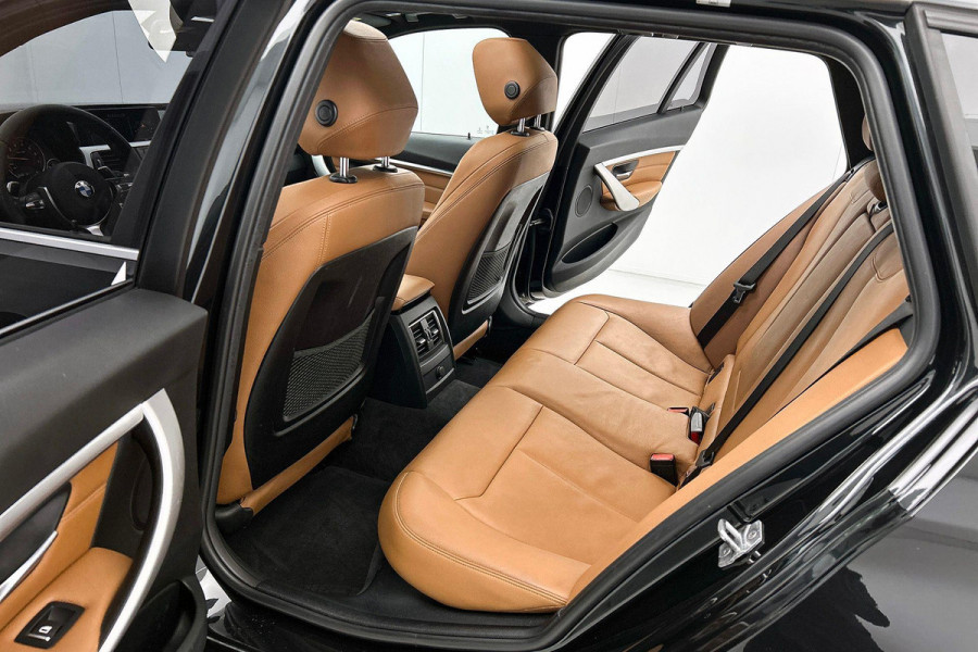 BMW 3 Serie Touring 320i Edition M Sport Shadow High Executive (NL-auto, Panorama, StoelV, Climate Con, Navi Pro, Etc)