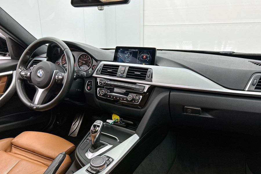 BMW 3 Serie Touring 320i Edition M Sport Shadow High Executive (NL-auto, Panorama, StoelV, Climate Con, Navi Pro, Etc)