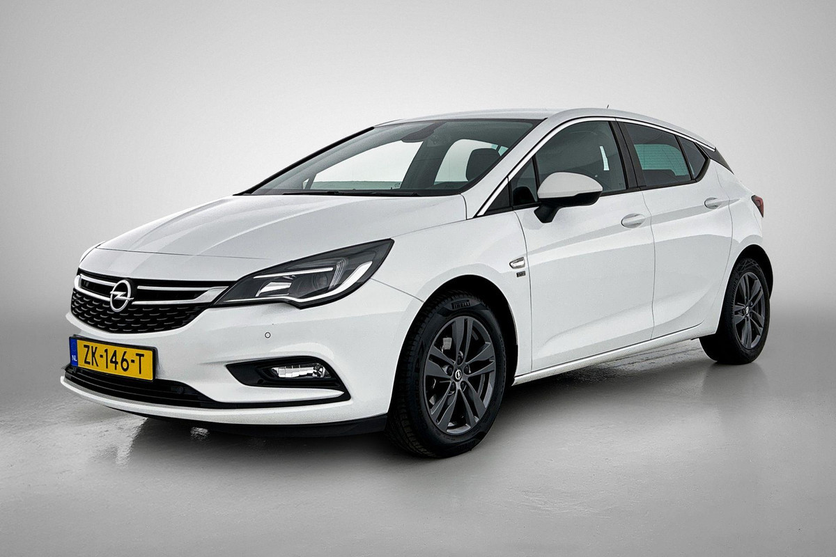 Opel Astra 1.0 Turbo 120 Jaar Edition (NAVIGATIE, CARPLAY, PARKEERSENSOREN, CLIMA, 1e EIGENAAR, GOED ONDERHOUDEN) Opel Astra 1.0 Turbo 120 Jaar Edition (NAVIGATIE, CARPLAY, PARKEERSENSOREN, CLIMA, 1e EIGENAAR, GOED ONDERHOUDEN)