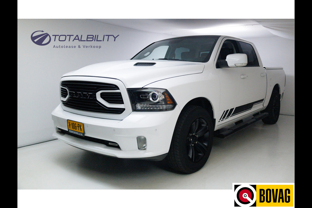 Dodge Ram 1500 5.7 V8 4x4 Quad Cab Sport | Dealer onderhouden | Leer | Stoelverw. & Koeling | Groot mm scherm met touchscreen, Trekhaak, 20" velgen, PRIJS EXCL. BTW!! Dodge Ram 1500 5.7 V8 4x4 Quad Cab Sport | Dealer onderhouden | Leer | Stoelverw. & Koeling | Groot mm scherm met touchscreen, Trekhaak, 20" velgen, PRIJS EXCL. BTW!!