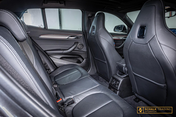 BMW X2 SDrive20i|NAP|M-sport|Pano|Trek|Cam|HUD|Dealer ond|
