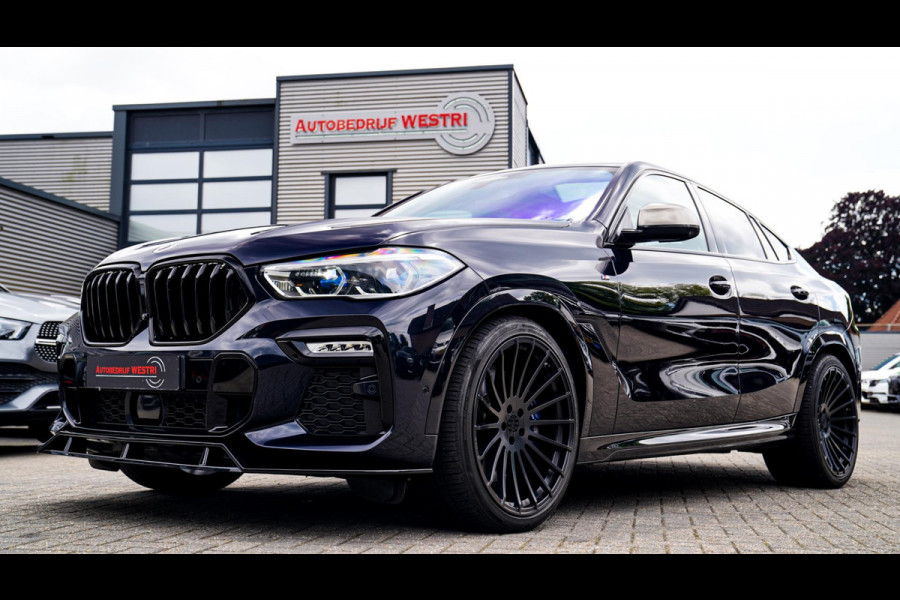 BMW X6 M50i High Executive | Carbon inleg | Krystallen Pook | Harman/Kardon | X6M look | 360 | Uitlaatklep | BMW Drive Assisted |