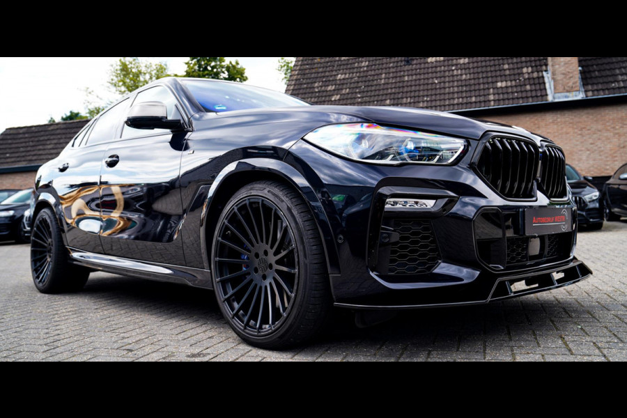 BMW X6 M50i High Executive | Carbon inleg | Krystallen Pook | Harman/Kardon | X6M look | 360 | Uitlaatklep | BMW Drive Assisted |