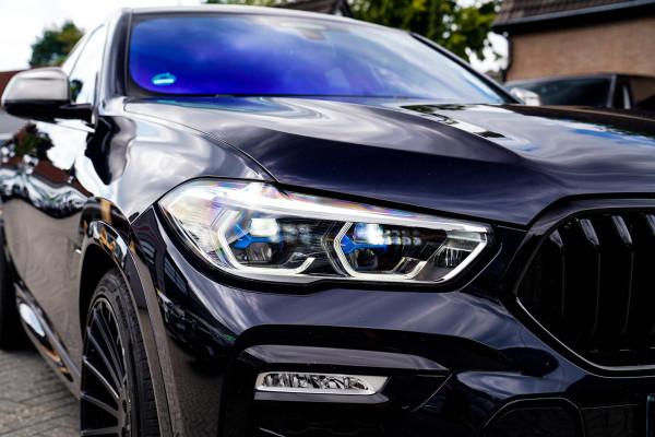 BMW X6 M50i High Executive | Carbon inleg | Krystallen Pook | Harman/Kardon | X6M look | 360 | Uitlaatklep | BMW Drive Assisted |