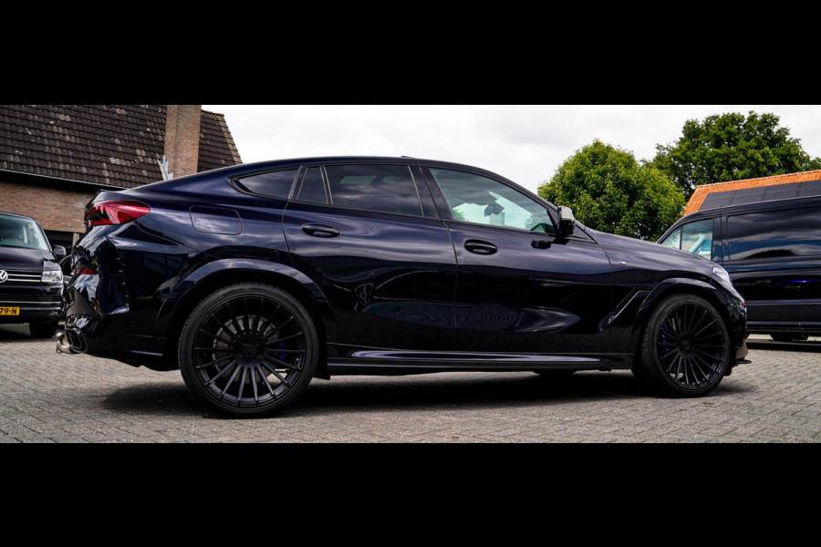 BMW X6 M50i High Executive | Carbon inleg | Krystallen Pook | Harman/Kardon | X6M look | 360 | Uitlaatklep | BMW Drive Assisted |