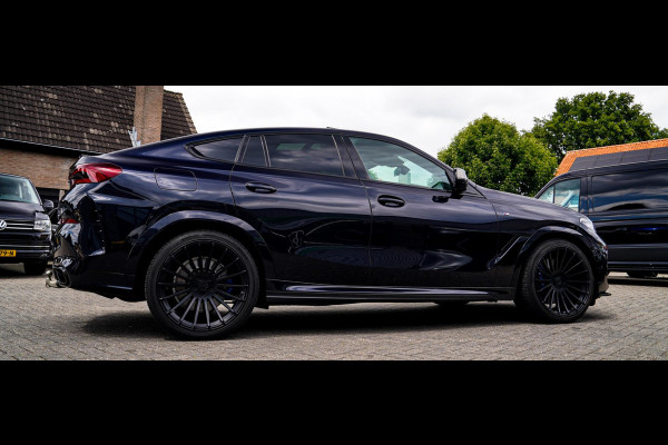 BMW X6 M50i High Executive | Carbon inleg | Krystallen Pook | Harman/Kardon | X6M look | 360 | Uitlaatklep | BMW Drive Assisted |