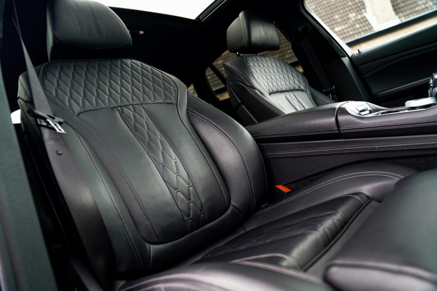 BMW X6 M50i High Executive | Carbon inleg | Krystallen Pook | Harman/Kardon | X6M look | 360 | Uitlaatklep | BMW Drive Assisted |