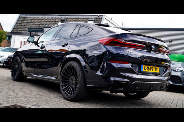 BMW X6 M50i High Executive | Carbon inleg | Krystallen Pook | Harman/Kardon | X6M look | 360 | Uitlaatklep | BMW Drive Assisted |