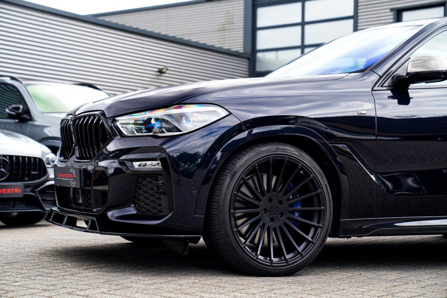 BMW X6 M50i High Executive | Carbon inleg | Krystallen Pook | Harman/Kardon | X6M look | 360 | Uitlaatklep | BMW Drive Assisted |