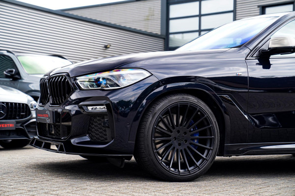 BMW X6 M50i High Executive | Carbon inleg | Krystallen Pook | Harman/Kardon | X6M look | 360 | Uitlaatklep | BMW Drive Assisted |