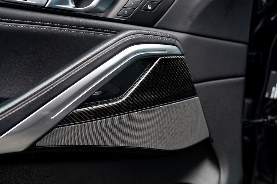 BMW X6 M50i High Executive | Carbon inleg | Krystallen Pook | Harman/Kardon | X6M look | 360 | Uitlaatklep | BMW Drive Assisted |