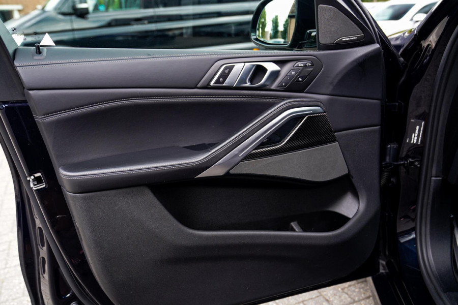 BMW X6 M50i High Executive | Carbon inleg | Krystallen Pook | Harman/Kardon | X6M look | 360 | Uitlaatklep | BMW Drive Assisted |