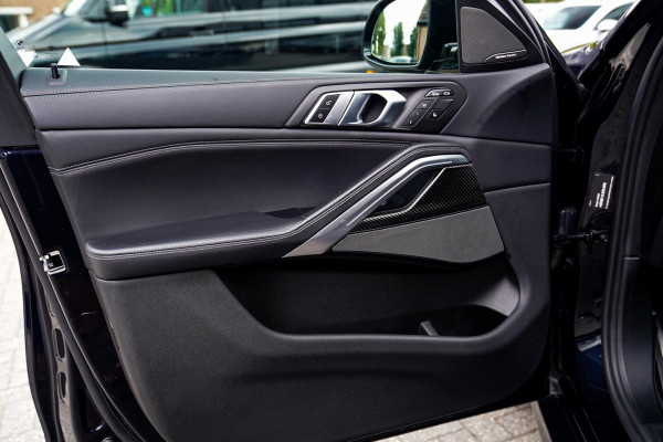 BMW X6 M50i High Executive | Carbon inleg | Krystallen Pook | Harman/Kardon | X6M look | 360 | Uitlaatklep | BMW Drive Assisted |