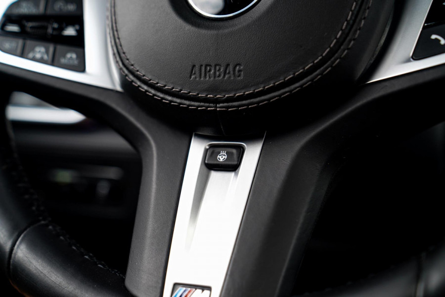 BMW X6 M50i High Executive | Carbon inleg | Krystallen Pook | Harman/Kardon | X6M look | 360 | Uitlaatklep | BMW Drive Assisted |