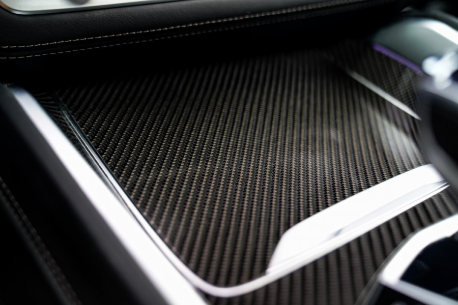 BMW X6 M50i High Executive | Carbon inleg | Krystallen Pook | Harman/Kardon | X6M look | 360 | Uitlaatklep | BMW Drive Assisted |