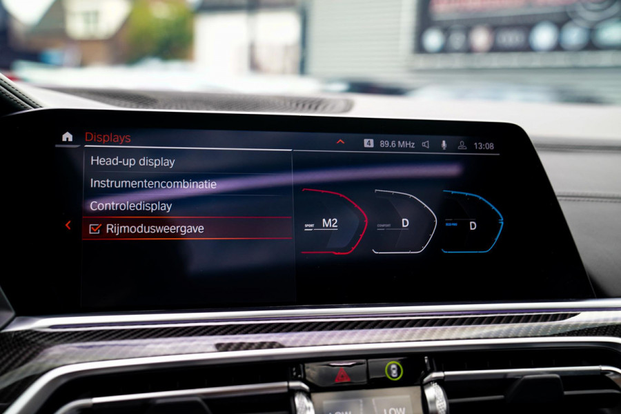 BMW X6 M50i High Executive | Carbon inleg | Krystallen Pook | Harman/Kardon | X6M look | 360 | Uitlaatklep | BMW Drive Assisted |