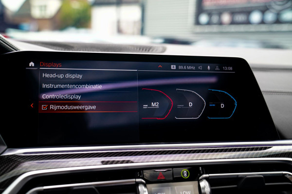 BMW X6 M50i High Executive | Carbon inleg | Krystallen Pook | Harman/Kardon | X6M look | 360 | Uitlaatklep | BMW Drive Assisted |