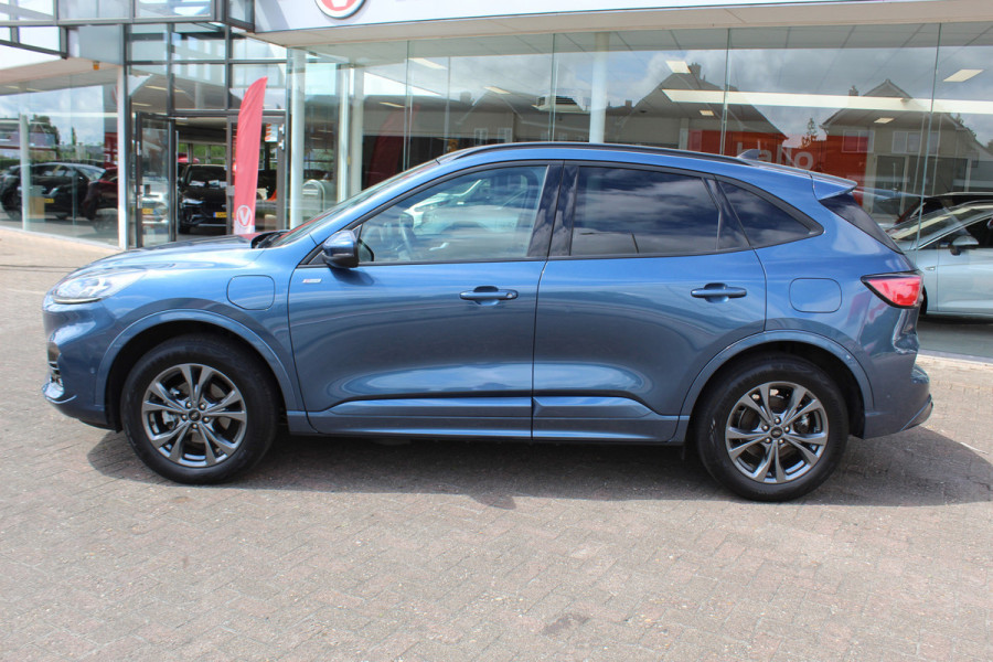 Ford Kuga 2.5-225pk PHEV ST-Line X. , Mooie Hoge zit , 1500kg Trekgewicht Hybride rijden voor een redelijke prijs ! Stoel- en voorraamverwarming, B&O soundsystem, navigatie, telefoonvoorb., metallic lak, LM wielen, side- en lane assist, camera v+a, adaptive cruise control, elektr. achterklep etc., etc.