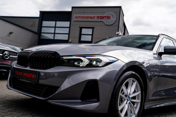 BMW 3 Serie Touring 320e | Panorama | Elektrische trekhaak | Luxe Leder/stof | Achteruitrijcamera | Shadowline | Stoelverwarming |
