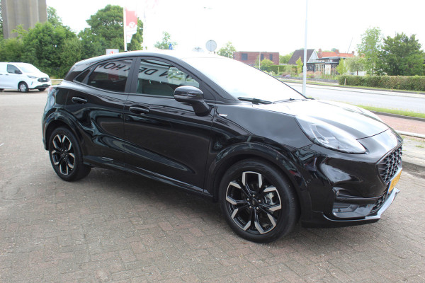 Ford Puma 1.0-125pk EcoBoost Hybrid ST-Line X. April 2024 ! Slechts 9.700km ! Autm. airco, navigatie, telefoonvoorb., camera, pdc v+a, parkeerassistent, LED verl., metallic lak, LM wielen, stoel-, stuur- en voorraamverw., lane- en sideassist, adapt. cruise cntrl etc