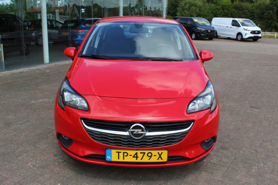 Opel Corsa 1.4 Favourite , 5 deurs , 90pk Airco , Cruise control , Navigatie , Bluetooth , LM velgen Parkeersensoren achter , Elek.ramen voor , City toets