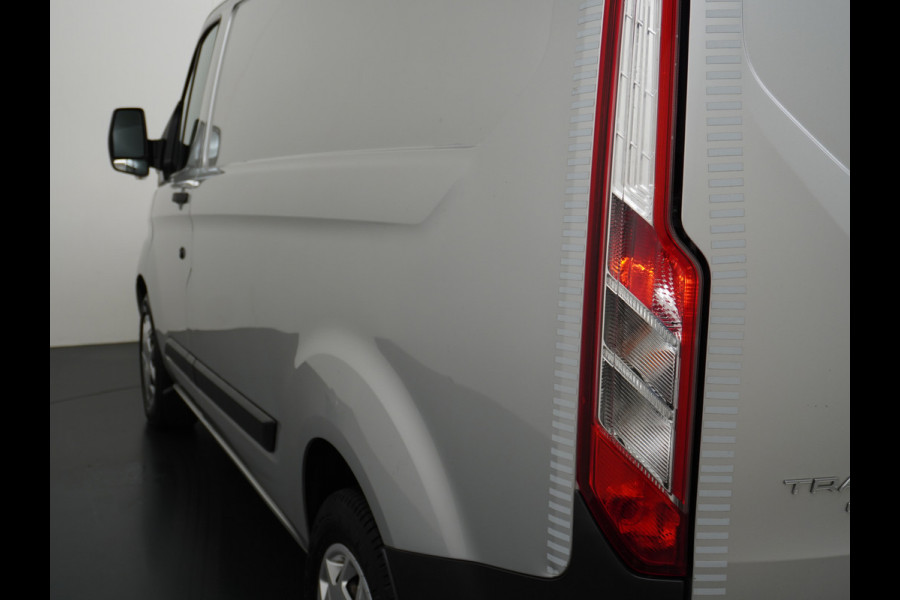 Ford Transit Custom Automaat 290 2.0TDCI 131PK L1H1 Navi Airco Cruise Camera Trekhaak Pdc Regen-/lichtsensor Euro 6 Trend Bluetooth Voorruit verwarmbaar Achterklep Zijschuifdeur Wandbetimmering Adaptieve bochtverl 1e Eigenaar Euro 6