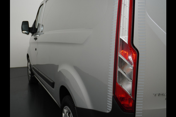 Ford Transit Custom Automaat 290 2.0TDCI 131PK L1H1 Navi Airco Cruise Camera Trekhaak Pdc Regen-/lichtsensor Euro 6 Trend Bluetooth Voorruit verwarmbaar Achterklep Zijschuifdeur Wandbetimmering Adaptieve bochtverl 1e Eigenaar Euro 6